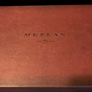 Size 12, brown-taupe, leather dress loafer.